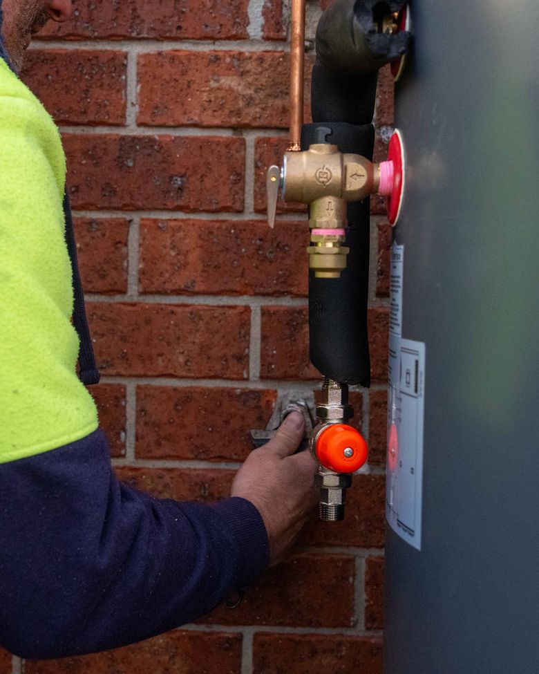 Neat, lagged pipework on a Goldsure heat pump hot water install
